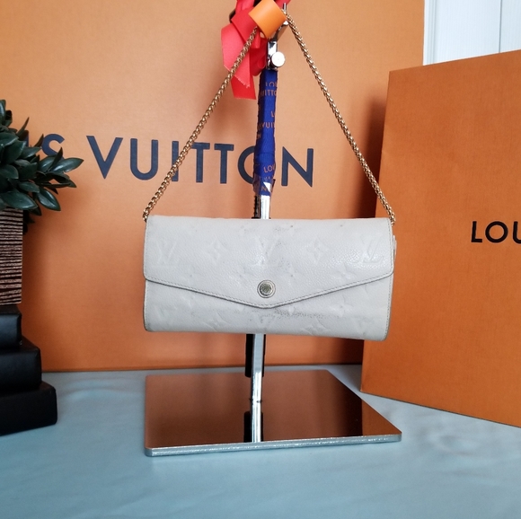 LOUIS VUITTON Portefeuille Empreinte Neige Mono - Picture 5 of 16